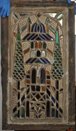 Stucco glass window with representation of a mosque